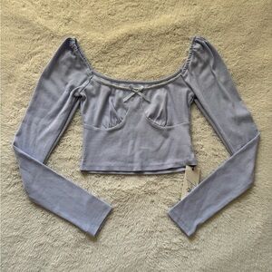 Reigning queen periwinkle top